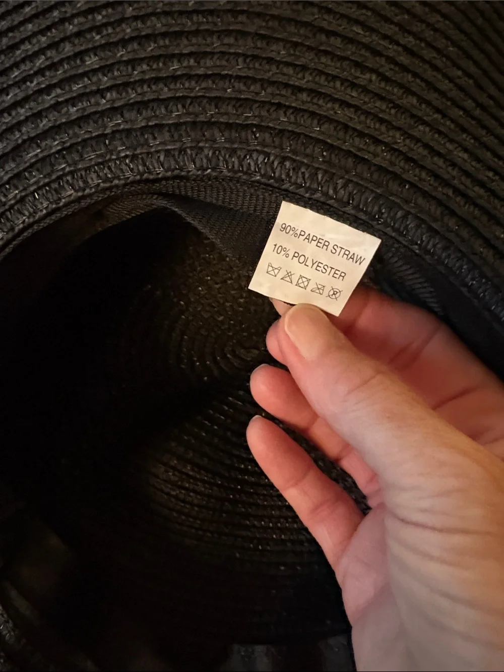 Packable, roll up floppy straw hat.